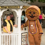 Our Village Host and mascot, Yummie, welcome guests to Kitchen Kettle!