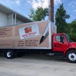 A brand new and freshly wrapped delivery truck.