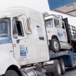 trucks on flat bed ready for transport