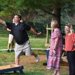 The team enjoying a fun game of cornhole at the annual service meeting dinner!