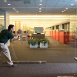 Cleaning glass doors in a commercial office environment