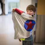 Damaged linens are upcycled into princess costumes and superhero capes for children in need!