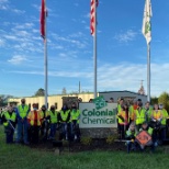 Pictured is a group of our employees volunteering for a Adopt-a-Highway Trash Pickup event.