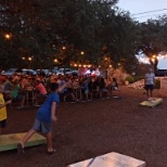 Outside patio, with corn hole and live music