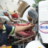 Crane Technician working on boom truck