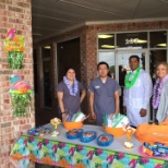 Carus Dental Hygienists and Doctors give out free samples and Luau Favors outside their office.