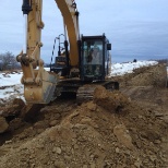 Me digging collection cable trenches