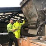 Pouring concrete into the mould.