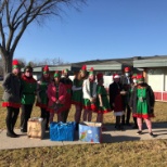 Leadership team delivering holiday cookies to our clients and staff.