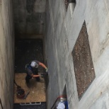 Confined space repair - hooked to new life safety device