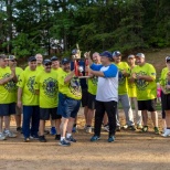 Staff plays a friendly game of baseball against our 