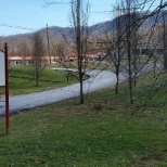 Facility Sign with the Facility in the background