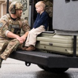 Child w/ SWAT team member