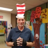 Custodian John D helping with Dr. Suess Day.