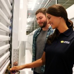 Potential customer is shown a unit by friendly Store Manager