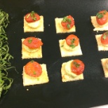 Parmesan shortbread with basil mascarpone mousse and sautéed baby tomato