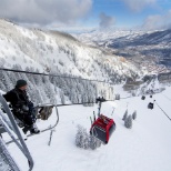 Lift Maintenance at work on the gondola at Aspen Mountain looking down to the town of Aspen