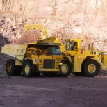 Loader and Haul Truck at the bottom of the quarry.