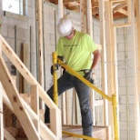 Safety technicians installing Rapid Rails on a new residential construction.