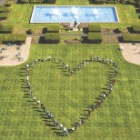 Team members formed a heart on the lawn at Masonicare Health Center during the COVID-19 pandemic.