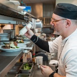 Chef prepares resident's meals