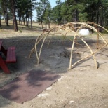 The frame of one of New Day's sweat lodges