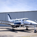 Beechcraft King Air B100 in front of the Winner Aviation main building - on a rare sunny day!