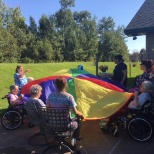 Enjoying the outdoors while playing balloon toss