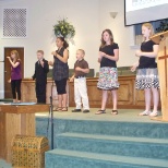 Students performing for the end of the year program.