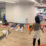 Weekly yoga class at ACV's HQ is a great workplace perk