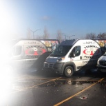 Some of our sales vans ready to run their routes.