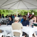 Enjoying good company at an employee lunch.