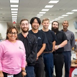 Photo of our office and support team members.