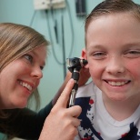 Our pediatrician, Dr. Odom seeing one of her pediatric patients.