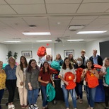 Associates help pack backpacks for our annual Backpack program 