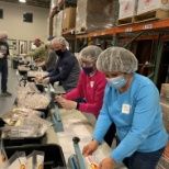 Volunteering to package food for local food pantry