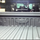 Spray-on Bedliner application with Vehicle Logo