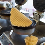 A favorite past-time for many Oberweis employees-- making our delicious waffle cones each morning.