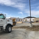 Alexander Lumber CDL Truck Driver making a delivery to a job site.