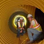 Engineers in pipe