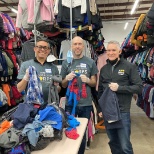 HMH Volunteer Week 2022 sorting clothes at Catie's Closet for Boston Schools