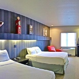 One of our designer Double Queen hotel rooms.