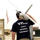 Employee carrying an UAV 2