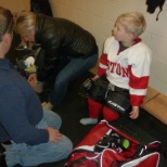 My youngest grandson learning hockey.