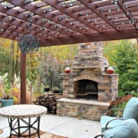 Beautiful outdoor pergola and fireplace.