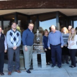 Associates with our ice sculpture for the Petoskey Winter Carnival.