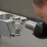 Quality inspection of a research test reactor fuel element.