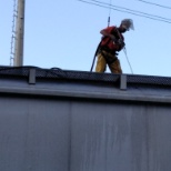 Me on top of railcar waterblasting