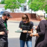 Helping Customers sign up for roof inspections.