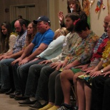 Staff being hypnotized at the annual Christmas party.